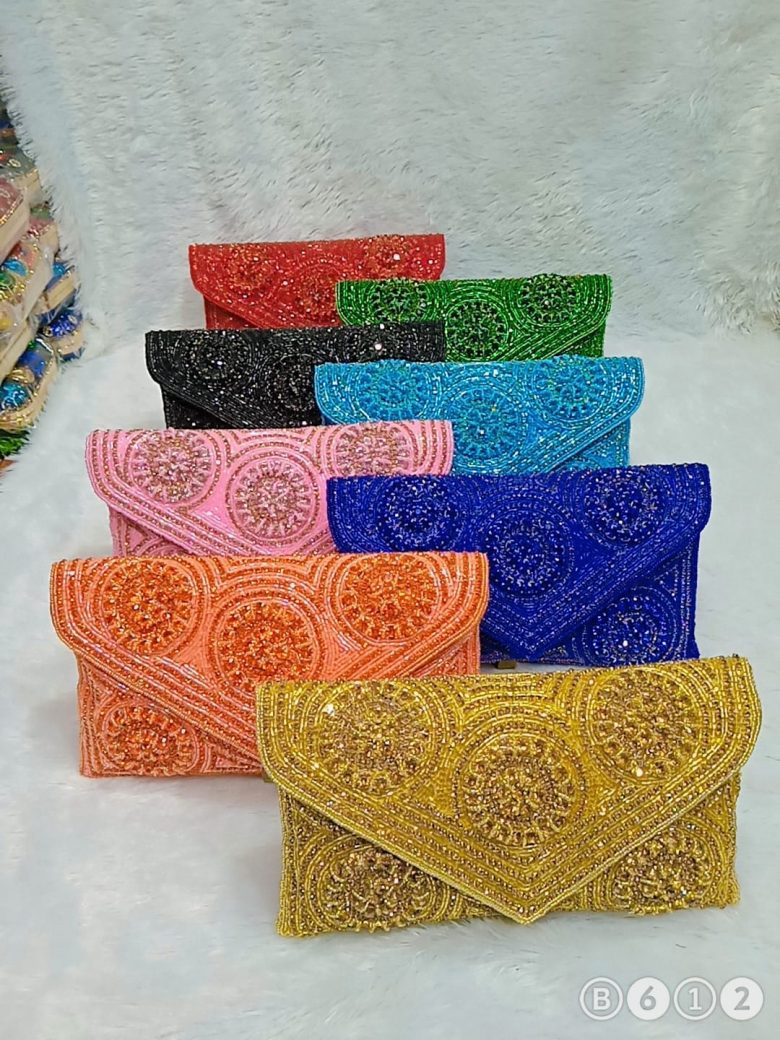 Buy Indian Handmade Women's Embroidered Clutch Purse Potli Bag Pouch  Drawstring Bag Wedding Favor Return Gift for Guests Free Ship Online in  India - Etsy | Embroidered clutch purse, Colorful clutches, Potli bags